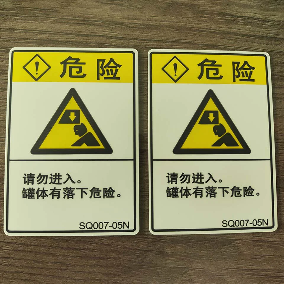 Self-adhesive warning labels